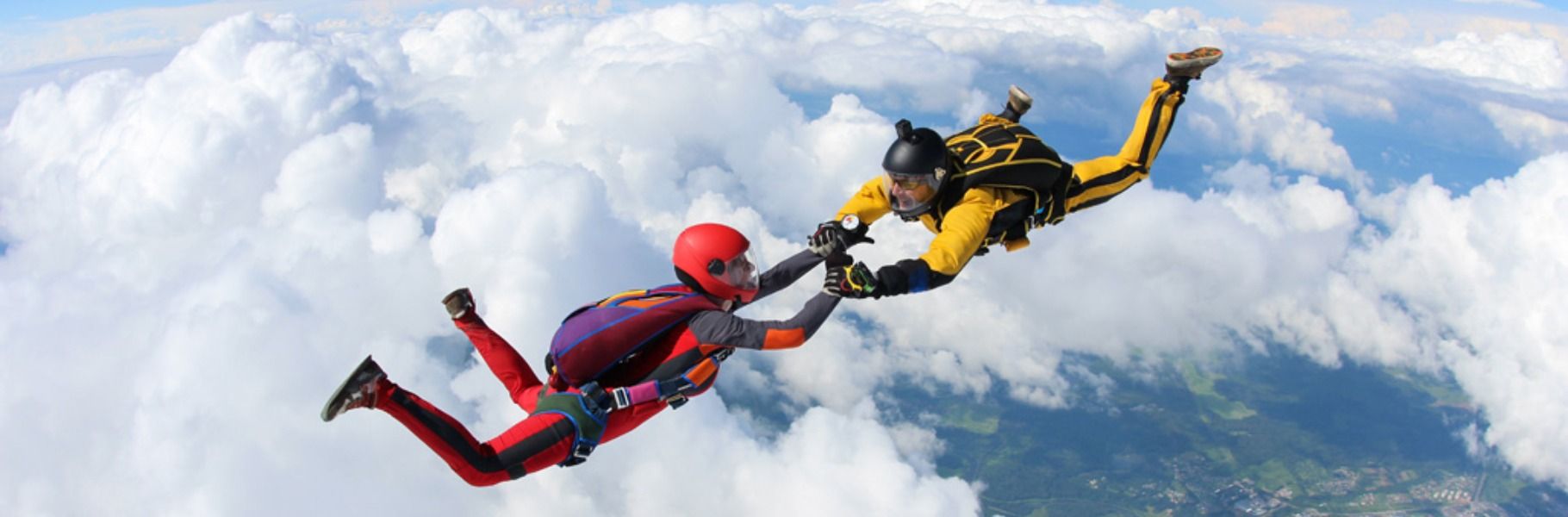 two people sky diving